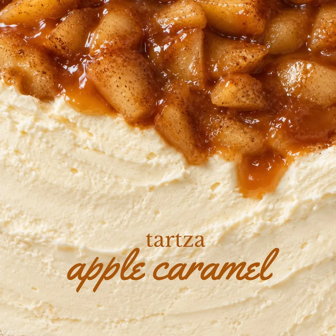 Caramelized apples spooned over a creamy cheesecake top