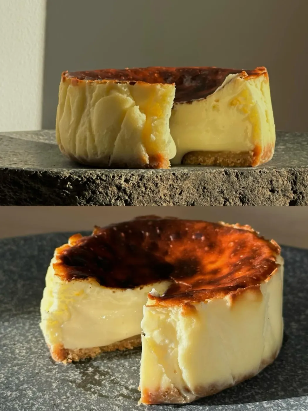 A classic tartza cut open, scorched top over a creamy centre, on a dark stone slab